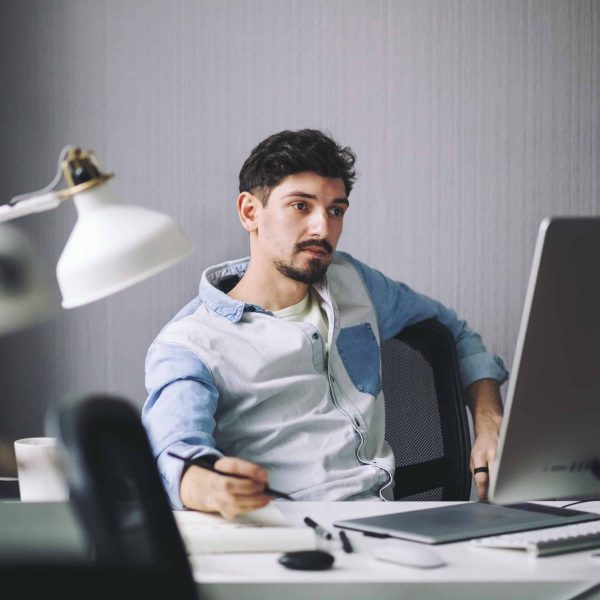 handsome-businessman-working-in-office.jpg